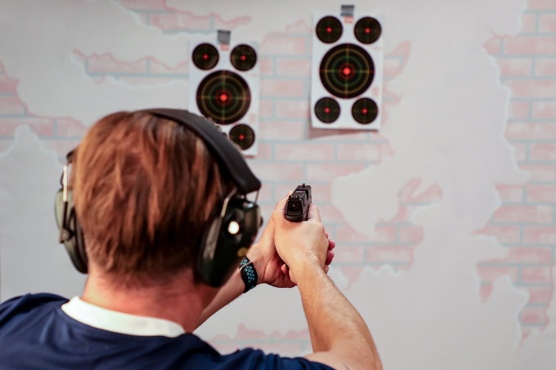 Student shooting at targets