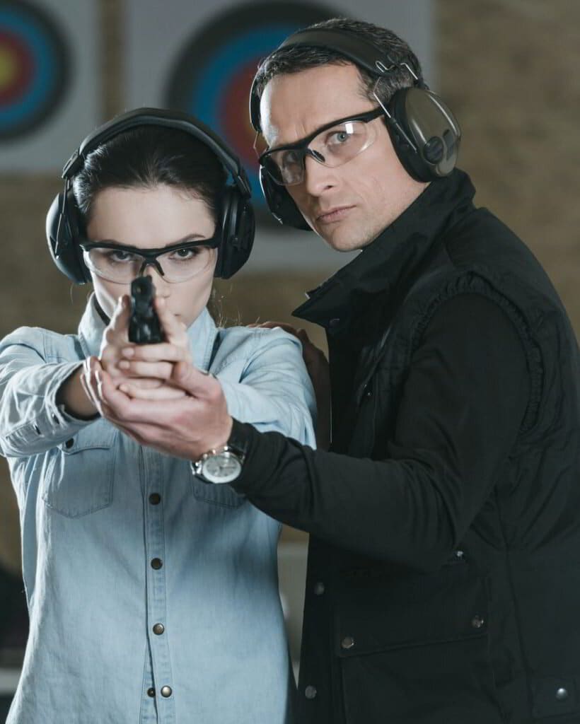 Student and instructor at the Colorado Boots shooting range