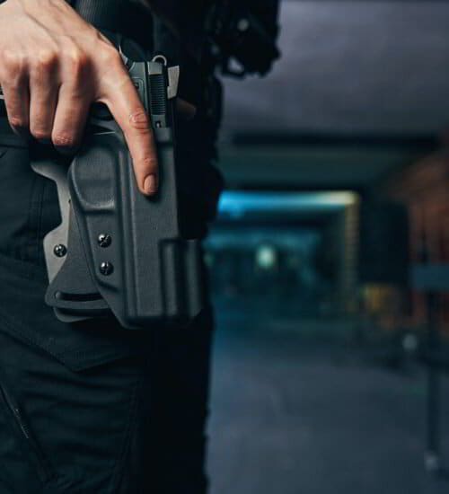 Student getting ready to shoot her handgun